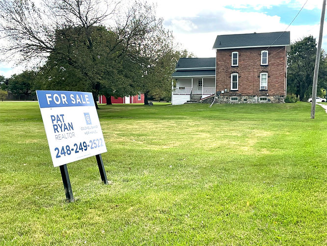  Canton property of suspected Underground Railroad stop adorned with for sale sign