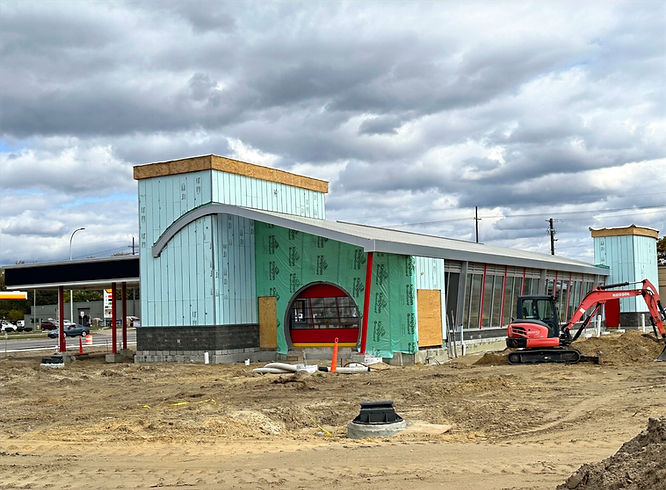  Futuristic building under construction on Ford Road is a one-of-a-kind vehicle cleaner